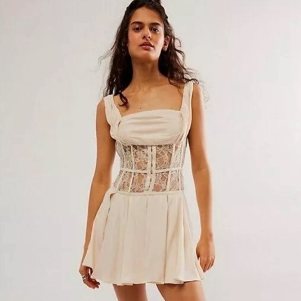 FREE PEOPLE cram mini silhouette and corset design with sheer lace corset